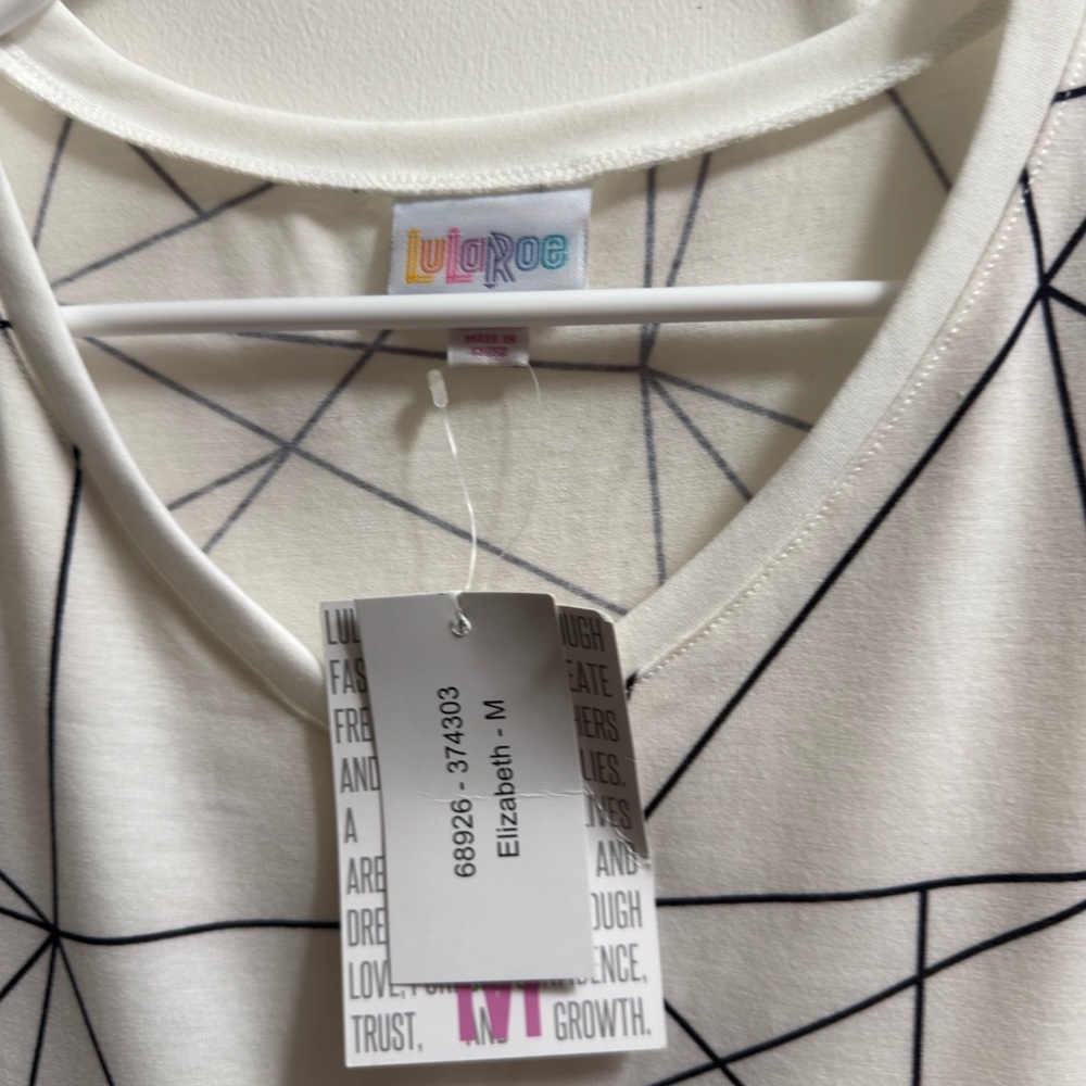 LuLaRoe White and Black Geometric Pattern Top